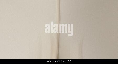 A simple abstract background featuring light beige and subtle vertical line in the center of the image Stock Photo