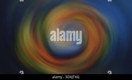 Abstract swirling vortex of yellow and blue colors creating a mesmerizing and dynamic visual effect Stock Photo