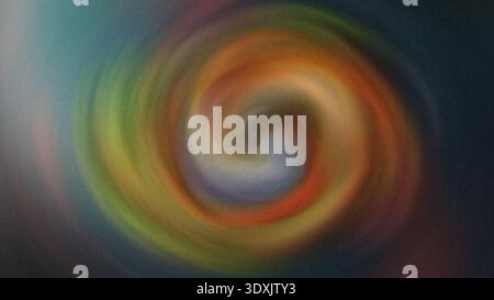 Abstract blurred swirl of vibrant colors with orange yellow green and blue tones creating a dynamic effect Stock Photo