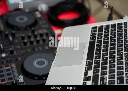 Close up of DJ controller and laptop setup. Stock Photo