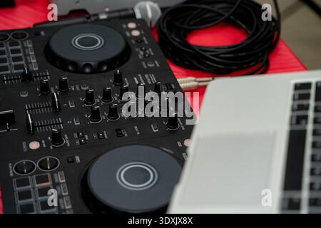 Close up of DJ controller and laptop setup. Stock Photo
