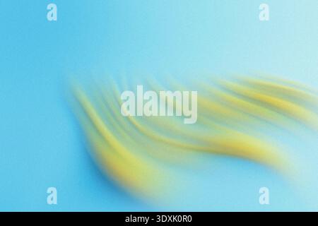 Abstract blurred background featuring a blend of yellow and blue colors creating a soft dreamy effect Stock Photo