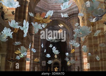 Cath��drale de la Major, Marseille Cathedral. Neo-Byzantine cathedral interior featuring a dramatic modern installation of suspended glass angels and c Stock Photo