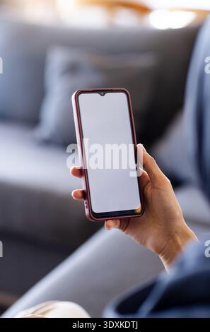 Open notebook is lying on wooden desk near window, with handwritten scenario text Stock Photo