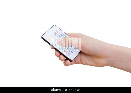 Close up of hand pressing button on RGB LED light remote controller isolated on white background Stock Photo