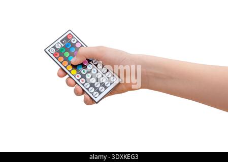 Hand holding RGB LED remote controller with color buttons isolated on white background Stock Photo