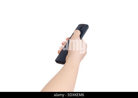 Hand holding wireless tv remote control isolated on white background used for controlling smart television and media devices Stock Photo