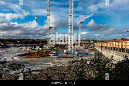 Cranes over the construction site with a cloudy sky background Stock ...