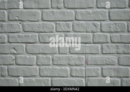 Textured white brick wall with a simple design Stock Photo