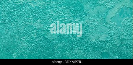 Teal textured wallpaper background with abstract relief, grunge decorative stucco wall surface, luxury teal interior backdrop Stock Photo