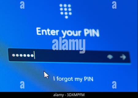 New York, USA - March 3, 2026: Entering Pin login to windows sytem start up close up macro view on computer screen Stock Photo