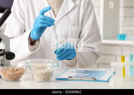 Scientist testing products in laboratory. HACCP concept Stock Photo