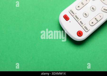 TV remote controller on green background Stock Photo
