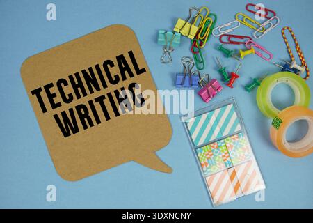 Technical Writing text with stationery on blue background Stock Photo