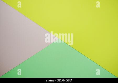 A minimal abstract image featuring intersecting geometric triangles in soft pastel color Stock Photo