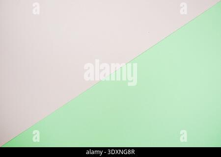 A minimal abstract image featuring intersecting geometric triangles in soft pastel color Stock Photo