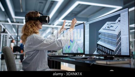 Woman Wearing VR Headset Creates 3D Model For Architectural Project. Stock Photo