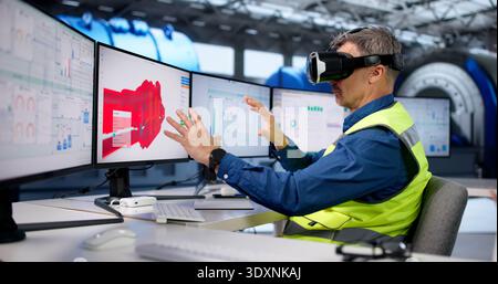Engineer Designs Gas Refinery Using Virtual Reality And AR 3D Glasses. Stock Photo