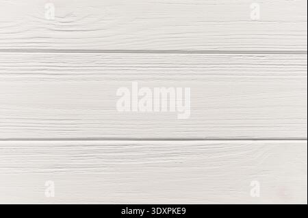 Gray painted wooden planks creating a rustic background texture, ideal for design projects and adding a natural charm touch Stock Photo