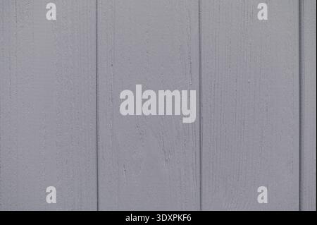 Gray painted wooden planks creating a rustic background texture, ideal for design projects and adding a of natural touch charm Stock Photo