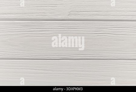 Gray painted wooden planks creating a rustic background texture, ideal for design projects and adding a natural touch of charm Stock Photo