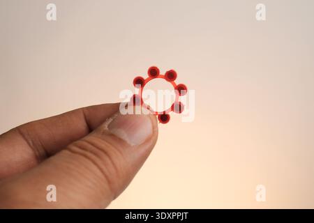 Basra, Iraq- March 04, 2026: Close Up View of Red Plastic Cap Gun Ring Caps Stock Photo