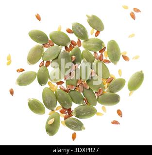 Pumpkin seeds with flax seed mix isolated on white background. Clipping path. Top view. Stock Photo
