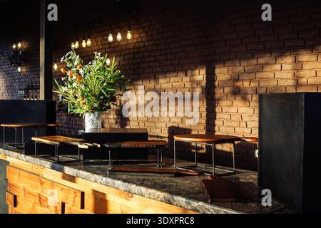 Industrial Rooftop Lounge with Warm Edison Lights Stock Photo