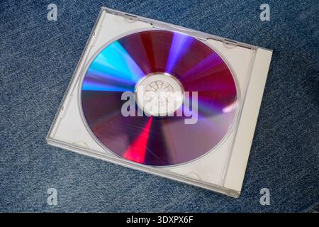 A case-style holder for blank DVDs on blue  background Stock Photo