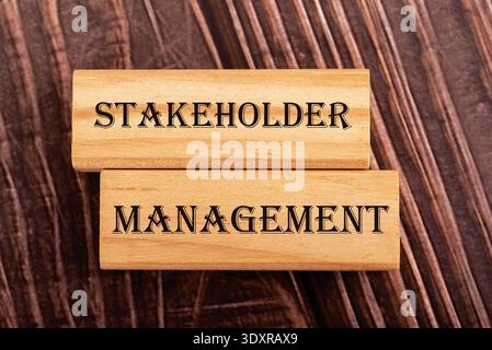 Stakeholder Management text on wooden blocks. Business concept for corporate strategy, relationship and project leadership on wooden background Stock Photo