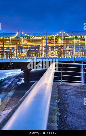 String of coloured light bulbs outside sports bar on South Pier,Blackpool,UK Stock Photo