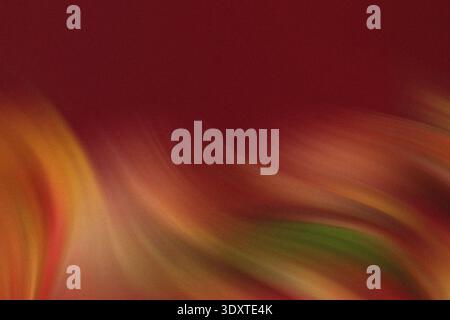 Abstract blurred background with shades of red orange green and brown creating a soft gradient effect Stock Photo