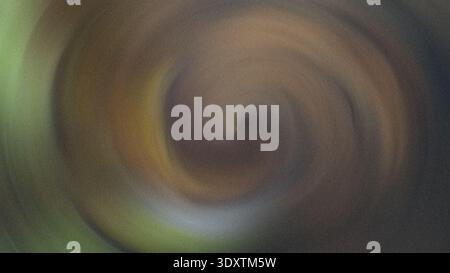 Abstract blurry image featuring shades of brown green and white creating an indistinct visual texture Stock Photo