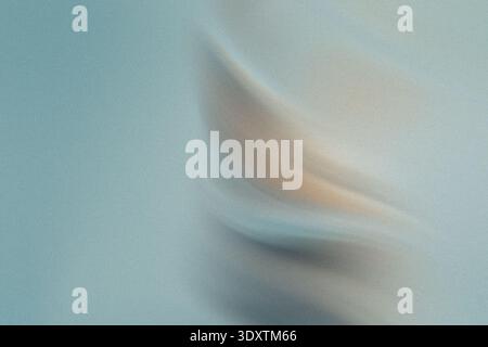 A blurry close up shot of a light blue wall with a faint white object partially visible on the side Stock Photo