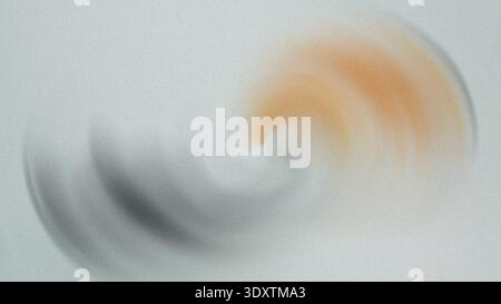 Abstract blurry background with soft colors showing shades of gray orange and white in a watercolor style Stock Photo
