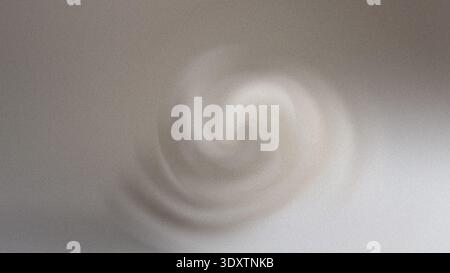 A soft swirl of white and gray creates an abstract pattern that fills the entire frame with a gentle motion Stock Photo
