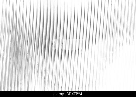Abstract blurred grayscale image featuring flowing lines and soft gradients of light and shadow Stock Photo