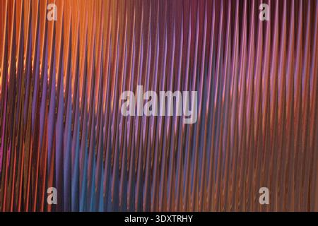 Abstract background featuring blended shades of purple orange and brown creating a wavy pattern Stock Photo