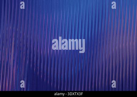 A softly blurred abstract background with swirling gradients of dark blues and subtle purple highlights Stock Photo
