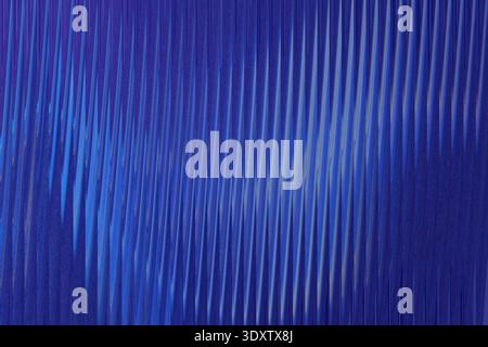 An abstract image featuring blurry shapes of light blue and white against a dark blue background Stock Photo