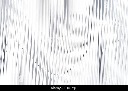 Abstract monochrome image featuring blurred curved shapes and lines with a soft gradient effect Stock Photo