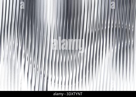 Abstract grayscale image featuring soft flowing lines and subtle gradations of light and shadow Stock Photo