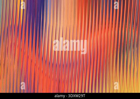 A vibrant abstract painting featuring a blend of warm and cool tones with dynamic brushstrokes and textures Stock Photo