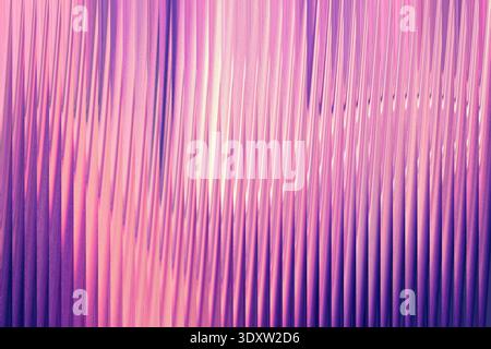 A soft gradient of pink and purple hues with vertical blurred lines creating an abstract composition Stock Photo