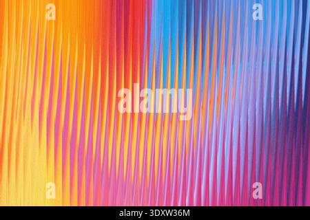 An abstract gradient of orange red blue and purple colors blending together in a smooth and flowing pattern Stock Photo