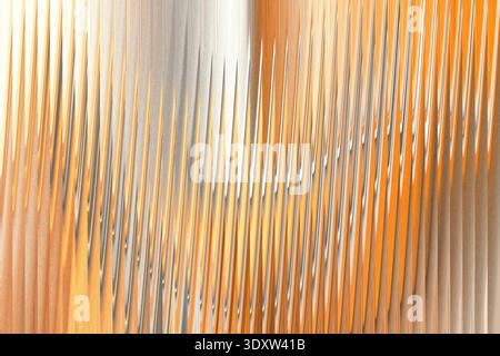 Abstract blurred background featuring shades of orange gray and white in a vertical pattern Stock Photo