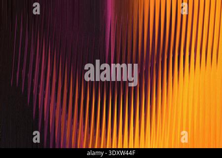 Abstract gradient background featuring a blend of orange yellow purple and dark brown vertical bands Stock Photo