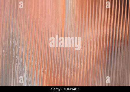 A close up shot showing blurred skin tones with shades of pink beige and light brown in the image area Stock Photo