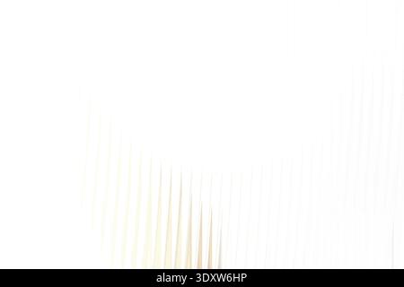 A blurry abstract image featuring a gradient of white and light beige colors with subtle hints of green Stock Photo