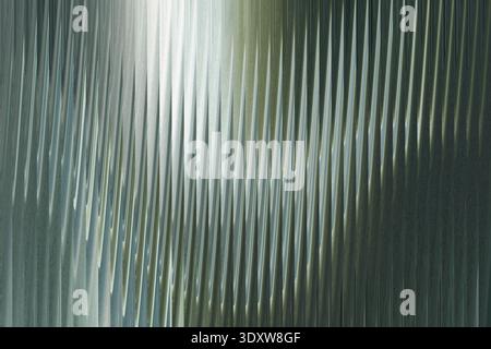 Abstract blurry image featuring shades of green and white with soft diffused light and motion effect Stock Photo